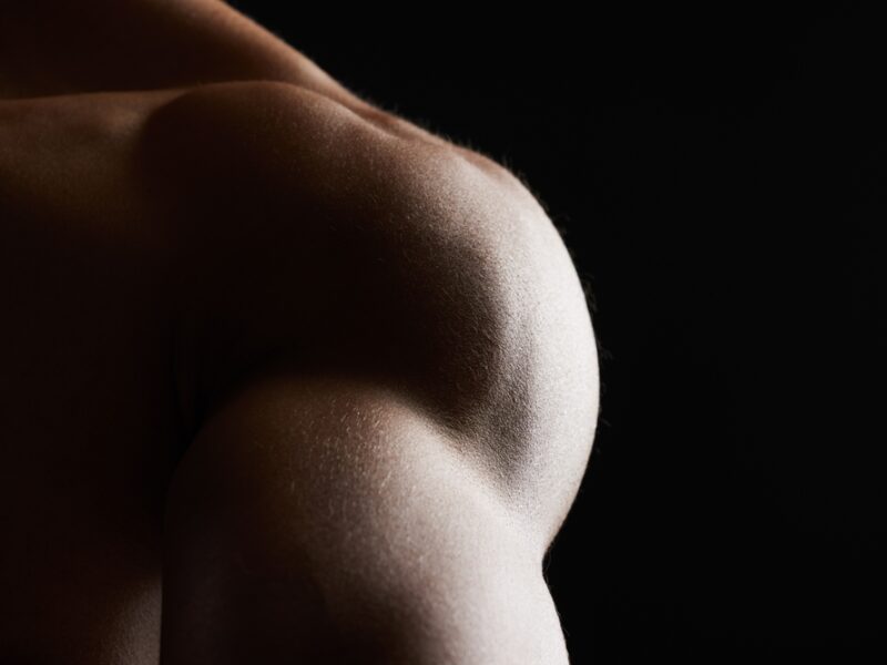 Shoulder,,Closeup,And,Muscle,Of,Man,In,Studio,Isolated,On